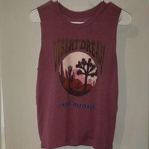 The brand is Fifth Sun. Size small.Deep mauve. Desert music festival .